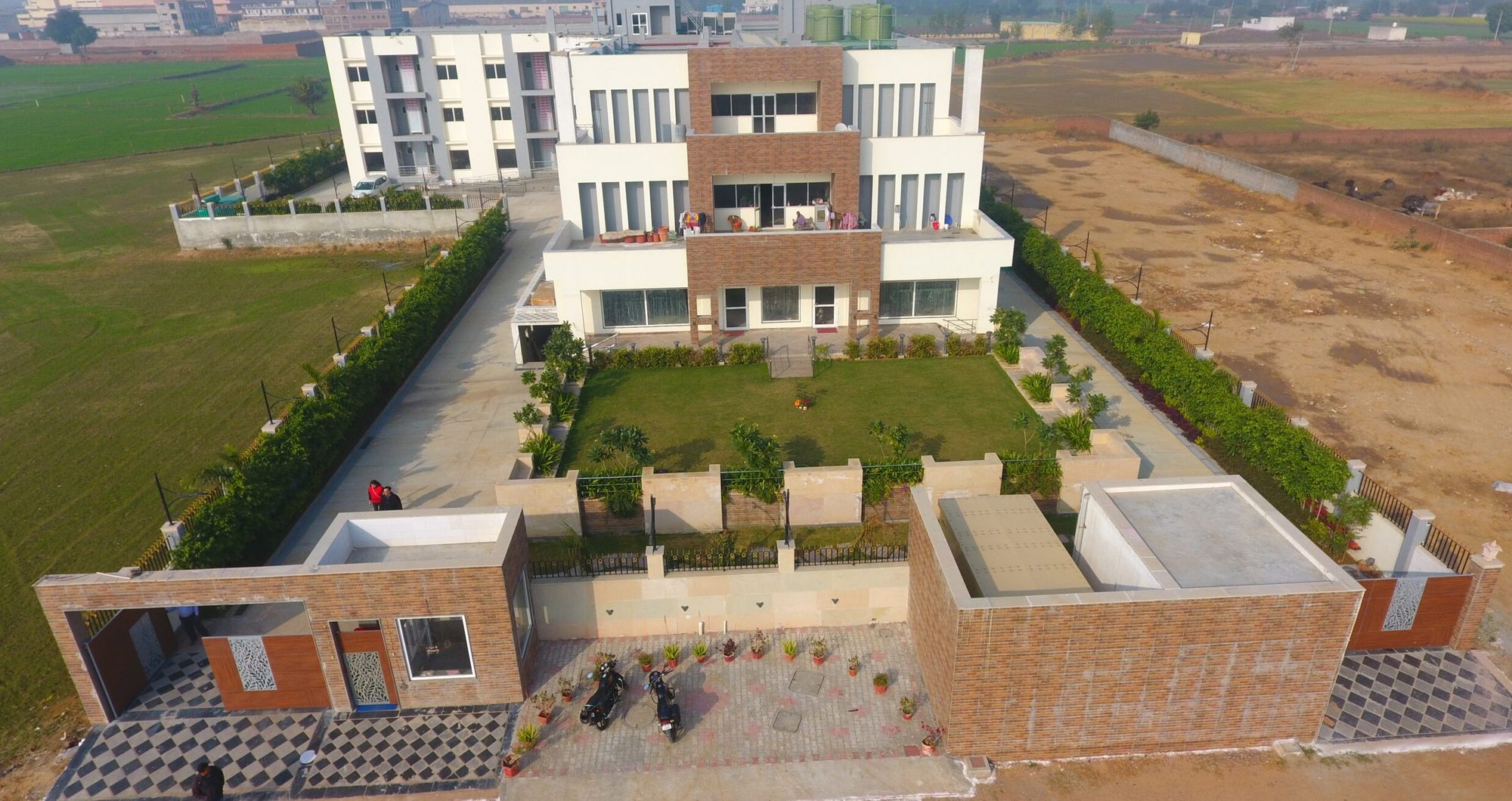 Aerial view of the ARCHON campus surrounded by open farmland