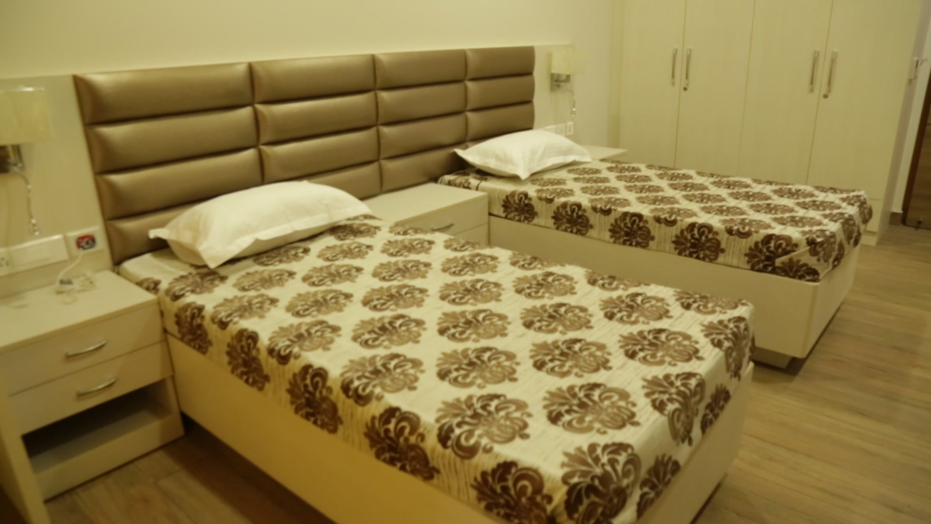 A bright, comfortable resident room at ARCHON
